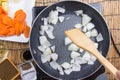 Chef stir-fried slice of onion in the pan for cooking Japanese p Royalty Free Stock Photo