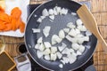 Chef stir-fried slice of onion in the pan for cooking Japanese p Royalty Free Stock Photo