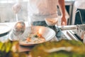 Close up of working chef preparing Chinese food, Food frying in wok pan. Sale and food concept Royalty Free Stock Photo