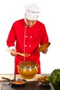 Chef taking food from pot Royalty Free Stock Photo