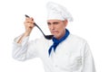 Chef tastes awful food Royalty Free Stock Photo