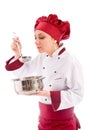 Chef tasting her food Royalty Free Stock Photo