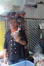 Chef teaching about Thai food in a vendor`s stall