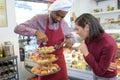 Chef with tiered display pastries Royalty Free Stock Photo