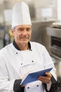 Chef using digital tablet Royalty Free Stock Photo