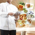 Chef using digital tablet Royalty Free Stock Photo