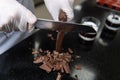 Chef is Using Knife Chop Dark Chocolate Bars