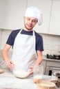 Chef whisked eggs and meal in a bowl Royalty Free Stock Photo