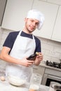 Chef whisked eggs and meal in a bowl Royalty Free Stock Photo