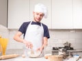 Chef whisked eggs and meal in a bowl Royalty Free Stock Photo
