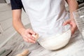 Chef whisked eggs and meal in a bowl Royalty Free Stock Photo