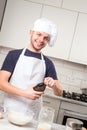 Chef whisked eggs and meal in a bowl Royalty Free Stock Photo