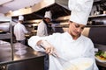 Chef whisking bowl of eggs