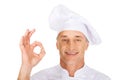 Chef in white hat with perfect sign