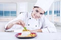 Chef Woman Decorating Delicious Food Royalty Free Stock Photo
