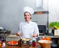 Chef woman portrait in the kitchen Royalty Free Stock Photo