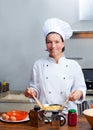 Chef woman portrait in the kitchen