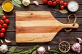 Chef work space with products and cutting board on wooden background top view mock up Royalty Free Stock Photo