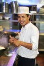 Chef at work with thumb up