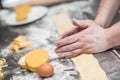 Chef& x27;s hands prepares Italian food stuffed pasta ravioli