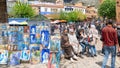 Chefchaouen medina center with unidentified people, blue city skyline on the hill, Morocco