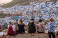 CHEFCHAOUEN, MOROCCO - MAY 05, 2023 - Tourists enjoying the sunset over famous blue colored city Chefchaouen in Morocco