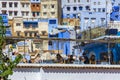Old houses and restaurant terrace in Chefchaouen medina Royalty Free Stock Photo