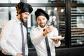 Chefs with cake in the office