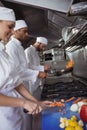 Chefs chopping vegetables Royalty Free Stock Photo