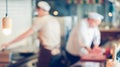 Chefs cooking in the kitchen Royalty Free Stock Photo