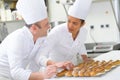 chefs with display pastries Royalty Free Stock Photo