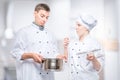 chefs emotions regarding foul soup in a pan, a portrait against the background