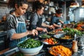 Chefs Preparing Fresh Vegetables in a Commercial Kitchen Royalty Free Stock Photo