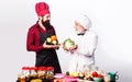 Chefs at work in restaurant kitchen. Cooking process. Professional cooking delicious food. Male chef with fresh Royalty Free Stock Photo