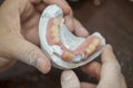 Cheking denture prothesis in dental laboratory Royalty Free Stock Photo