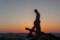 Chelm, Lubelskie, Poland - May 30, 2018: Jesus with a cross lying on the Way of the Cross on the Chelm Hill - view during sunset