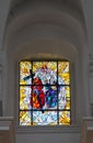 Chelm, POLAND - July 5, 2021: Stained glass window in the window of the church, the shrine of the Mother of God in CheÃâm in