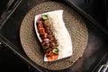 Chelo kabab or chello kebab with chicken tikka and rice served in dish isolated on red mat top view on table arabic food