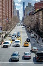 Chelsea City Street with traffic, aerial view from the High Line Rooftop Park, New York City Royalty Free Stock Photo