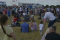 Cheltenham, United Kingdom - June 22, 2019 - Crowd of people on the grass, at anual hot air baloon festival Royalty Free Stock Photo