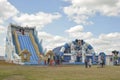 Cheltenham, united Kingdom - June 22, 2019 - Inflatable slide, obstacle course in playground at annual hot air balon festival at