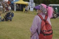 Cheltenham, united Kingdom - June 22, 2019 - woman with pink hair, from behind at anual hot air baloon festival in England