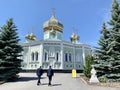 Chelyabinsk, Russia, June, 12, 2021.Two men walking to St. Simeon Cathedral on a sunny summer day. Russia, Chelyabinsk