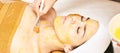 Chemic body peel. Cosmetology acne treatment. Young girl at medical spa salon Royalty Free Stock Photo