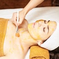 Chemic body peel. Cosmetology acne treatment. Young girl at medical spa salon Royalty Free Stock Photo