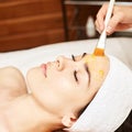 Chemic facial and body peel. Cosmetology acne treatment. Young girl at medical spa salon Royalty Free Stock Photo