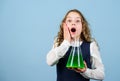 Chemical analysis. Harmful and vital options of chemical solute. Girl school pupil study chemical liquids. Learn Royalty Free Stock Photo