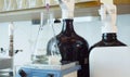 Chemical analysis laboratory. Flask with solution during titrating Royalty Free Stock Photo