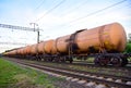 Chemical Cars on railway. Petroleum rail. The rolling stock with petrochemical tank cars. Transportation methanol tank wagons. Out