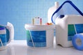 Chemical cleaning products for pool with blue mosaic background Royalty Free Stock Photo